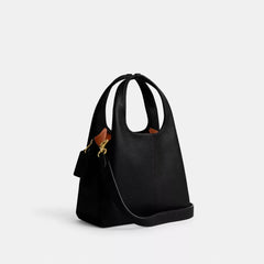 C*ACH - Lan* Shoulder Bag 23 - Brass/black