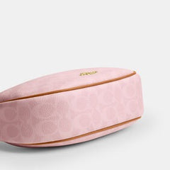 C*ACH - Emil* Shoulder Bag In Signature Canvas With Charms - Pink
