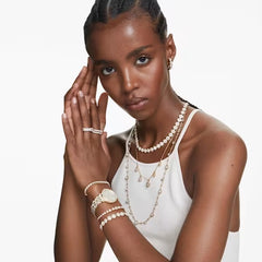 Swar*vski - Una Angelic bracelet Round cut, Pavé, Medium, White, gold finish - 5505469